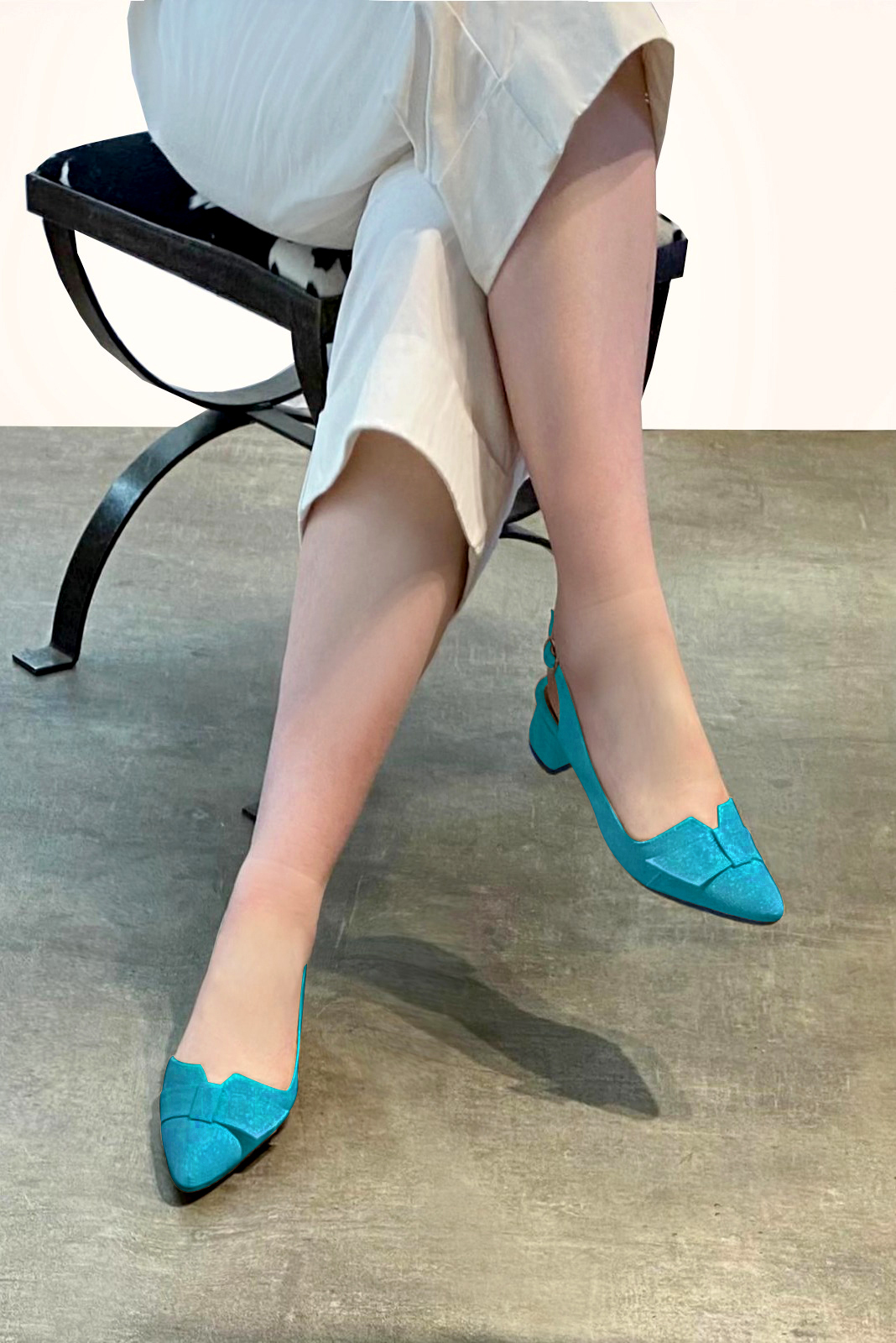 Turquoise blue women's slingback shoes. Tapered toe. Low flare heels. Worn view - Florence KOOIJMAN
